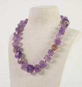 SINGLE STRAND NECKLACE OF GRADUATED FACETED AMETHYST BEADS with silver trigger clasp, 18in (45.