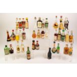 APPROX 102 MINIATURE BOTTLES OF LIQUEURS AND SPIRITS, approx 20 bottles with significant losses,