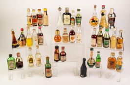 APPROX 102 MINIATURE BOTTLES OF LIQUEURS AND SPIRITS, approx 20 bottles with significant losses,