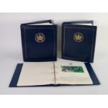 THE QUEEN'S GOLDEN JUBILEE 2002, collection of coin cases and stamps to three binders