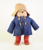 MODERN 'PADDINGTON' BLOND PLUSH TEDDY BEAR, with beige felt hat, blue duffle coat and red wellies,
