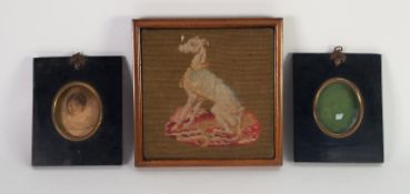 WALNUT FRAMED TABLE/TEAPOT STAND having woolwork panel depicting seated greyhound and raised on