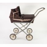 CIRCA 1950's DOLLS PRAM, plated metal frame and brown canvas body, plastic wheels and rubber
