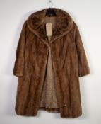 LADY'S 3/4 LENGTH EMBA NATURAL BROWN MINK COAT, with rounded collar and a FULL LENGTH LADIES