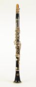 CORTON-CZECHOSLAVAKIA FOUR PART CLARINET, ebony and composition with gilt metal mounts and with