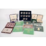 AFRICAN COINAGE: EIGHT PROOF COINAGE SETS IN COLOURED CARD ENVELOPE TYPE CASES, comprising: