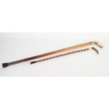 CANE RIDING CROP WITH STAG HORN HANDLE and hallmarked silver collar (lacks leather end) and a
