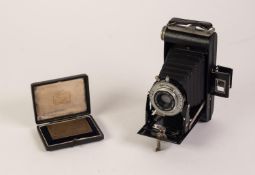 KODAK SIX-20 BELLOWS FOLDING 'BROWNIE' ROLL FILM CAMERA withy 'Dakon' shutter, in brown leather