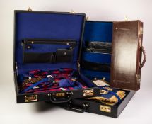 A BLACK LEATHER AND BLACK FABRIC CASE CONTAINING MASONIC REGALIA FOR WEST LANCASHIRE AND EAST