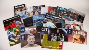 MANCHESTER CITY MEMORABILIA to include;  POSTERS FROM PROGRAMMES,  Season Reviews, Programmes,