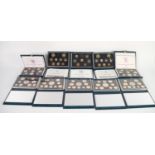 TEN ROYAL MINT ?UNITED KINGDOM PROOF COIN COLLECTIONS? IN HARD BLUE PRESENTATION CASES, five with