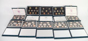 TEN ROYAL MINT ?UNITED KINGDOM PROOF COIN COLLECTIONS? IN HARD BLUE PRESENTATION CASES, five with