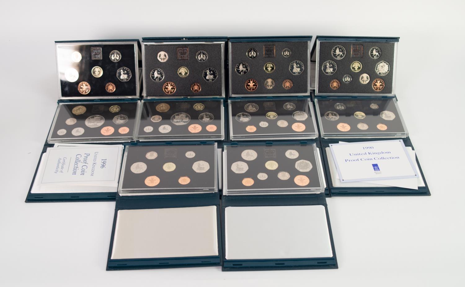 TEN ROYAL MINT ?UNITED KINGDOM PROOF COIN COLLECTIONS? IN HARD BLUE PRESENTATION CASES, four with