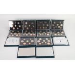 TEN ROYAL MINT ?UNITED KINGDOM PROOF COIN COLLECTIONS? IN HARD BLUE PRESENTATION CASES, four with