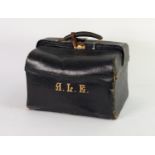GENTLEMAN'S EARLY 20th CENTURY BLACK MOROCCO CLAD TOILET/TRAVEL CASE, of oblong form with two-part