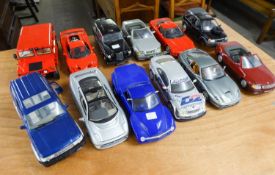 TWELVE APPROXIMATELY 1:18 SCALE DIE CAST MODELS OF LATE 20th CENTURY CARS AND MPVs, makers include