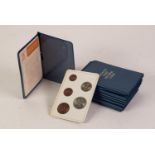 ELEVEN SETS OF BRITAINS FIRST DECIMAL COINS,  the five uncirculated coins in Royal Mint blue plastic