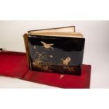 EARLY TWENTIETH CENTURY JAPANESE BLACK LACQUEUR AND SHIBAYAMA BOUND ALBUM OF ALBUMEN PHOTOGRAPHS