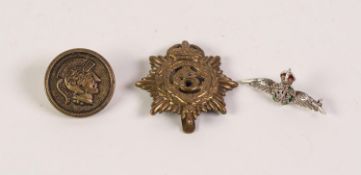 WHITE METAL YELLOW STONE SET, RED AND GREEN ENAMEL RAF WINGS BROOCH, a brass CAP BADGE and a BRASS