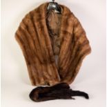 D. JUST, 9 RUE LONGCHAMP, NICE, FRANCE, LADY'S LIGHT BROWN BROAD MINK STOLE and a dark brown MINK