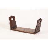 LATE VICTORIAN ROSEWOOD SLIDING AND FOLDING BOOK RACK, applied with Gothic pierced and engraved