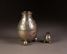 FOREIGN SILVER COLOURED METAL VASE, 800 STANDARD, of bulbous form with three ball feet, engraved