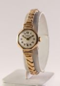 LADY'S LANCO 9ct GOLD CASED SWISS WRISTWATCH wiht 15 jewels movement, white arabic dial, with