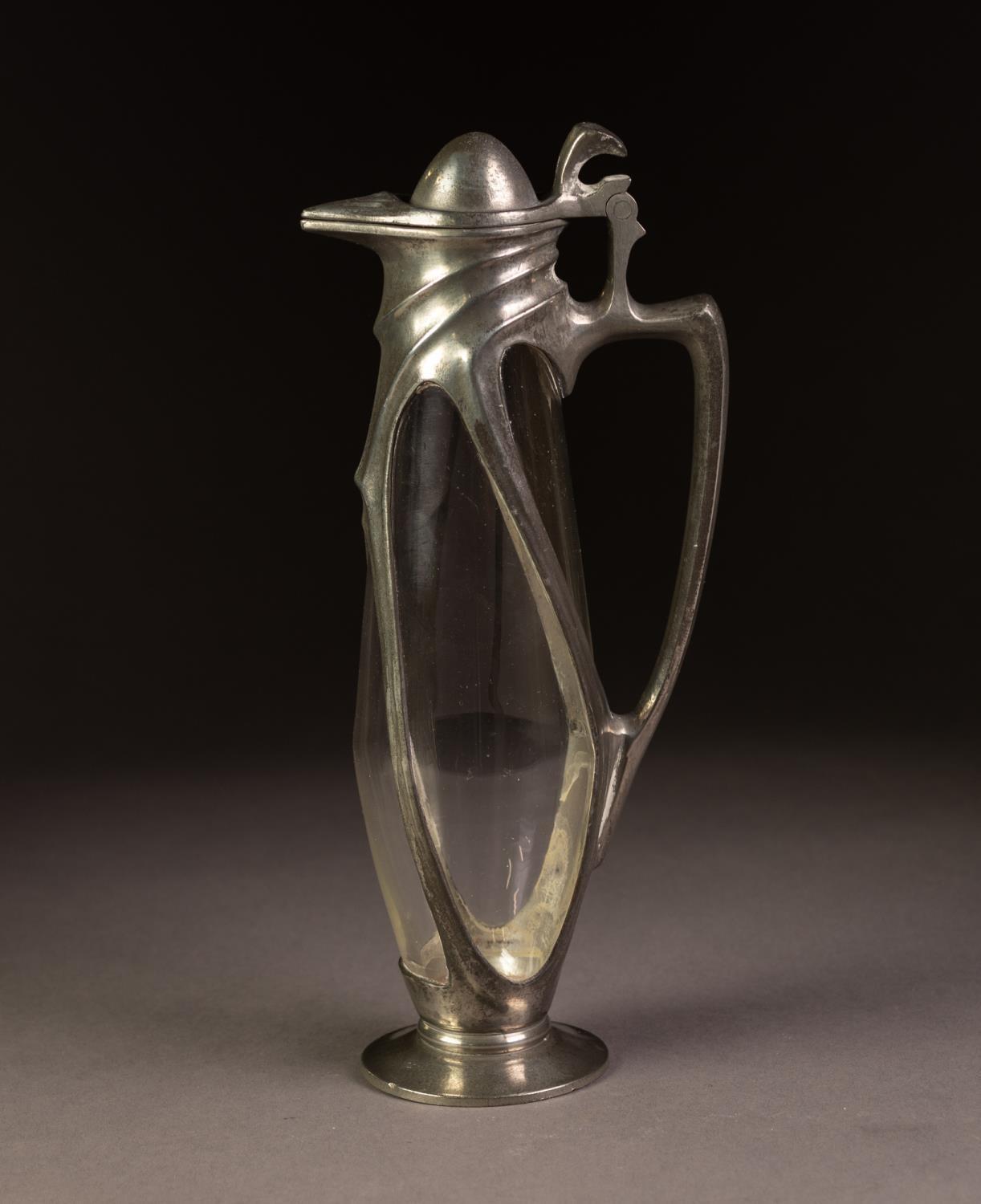 W.M.F STYLE ART NOUVEAU PEWTER MOUNTED SMALL GLASS CARAFE, of slender ovoid footed form with angular