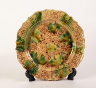 MID 18th CENTURY STAFFORDSHIRE TORTOISESHELL GLAZED CREAMWARE PLATE with a moulded scolloped edge