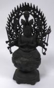 TWENTIETH CENTURY CHINESE BRONZE FIGURE OF KANNON WITH SIXTEEN ARMS, 14 ½” (36.8cm) high
