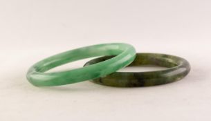 PALE JADE GREEN HARDSTONE BANGLE and ANOTHER of mottled dark green colour (2)