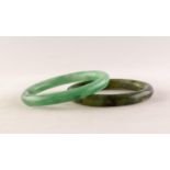 PALE JADE GREEN HARDSTONE BANGLE and ANOTHER of mottled dark green colour (2)