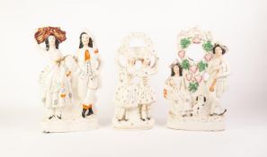 THREE VICTORIAN STAFFORDSHIRE POTERY MANTELSHELF FLAT BACK FIGURAL ORNAMENTS, two serving as