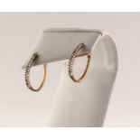 PAIR OF 9ct GOLD HORSESHOE SHAPED HOOP EARRINGS, the front of each set with fourteen tiny