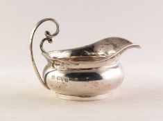 VICTORIAN SILVER SQUAT CIRCULAR CREAM JUG, bulbous with broad lip with raised double C scroll