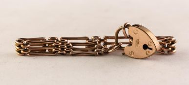 9ct GOLD GATELINK BRACELET with gold plated heart shape padlock clasp, the chain 8.8 gms