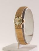 LADY'S SEIKO 'RAINBOW' GOLD PLATED TEXTURED BRACELET WATCH with 17 jewels mechanical movement, small