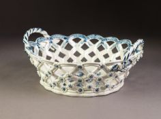 LATE 18th CENTURY CAUGHLEY PORCELAIN OVAL PIERCED BASKET, the base transfer printed with fruit, pine