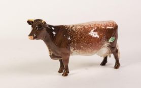 BESWICK MODEL COW INSCRIBED - CH. EATON WILD EYES 91st, printed mark and applied label, 8in (20.5cm)