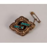 VICTORIAN GOLD COLOURED METAL QUATREFOIL BROOCH, crossbanded with two rows of small turquoise (one