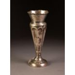 EDWARD VII WEIGHTED SILVER TRUMPET VASE, with flared, wavy rim above floral embossed panels and