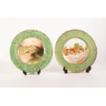 TWO ROYAL DOULTON SIGNED AND HAND PAINTED CHINA CABINET PLATES WITH GREEN AND GILT BORDERS, one by