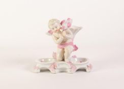 EARLY TWENTIETH CENTURY CONTINENTAL PRESS MOULDED PORCELAIN FIGURAL DOUBLE SALT STAND, white