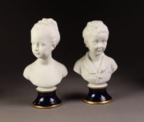 PAIR OF MODERN LIMOGES BISCUIT PORCELAIN BUSTS OF BOY AND GIRL, on blue glazed gilt bordered socles,