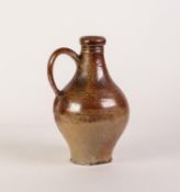 AN EIGHTEENTH CENTURY PROBABLY RHENISH SALT GLAZED STONEWARE JUG, the neck grooved for tying a