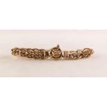 GOLD COLOURED METAL CHAIN BRACELET with interlinked large and small curb pattern links, with ring