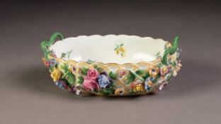 LATE 19th CENTURY MEISSEN PORCELAIN OVAL BON BON DISH with ribbon handles, the interior polychrome