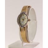 MARCEL DRUCKER LADY'S GOLD PLATED BRACELET WATCH with Japanese quartz movement, white oval dial with
