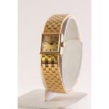 OMEGA 18ct GOLD LADY'S BRACELET WRISTWATCH with tiny square dial with baton numerals, in case,