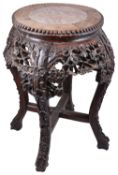 An early 20th century Chinese export rosewood low jardiniere stand
